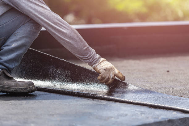 Professional Waterproofing technician working in Greenwich, KS